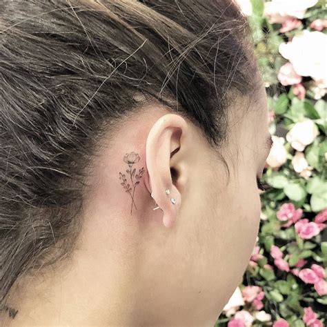 flower tattoo ear|cute tiny ear tattoos.